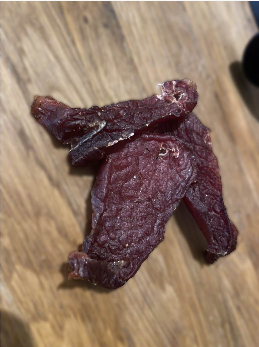 Beef jerky made with approximately 100 PPM sodium nitrite - light pink color
